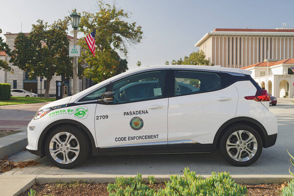 Image showing a City of Pasadena official Chevrolet Bolt EV car promoting the  Residential Electric Vehicle and Charger Incentive Program.