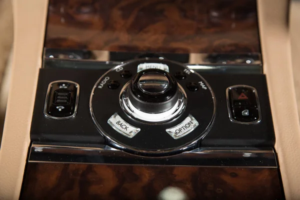 Close up of a control panel in a modern car interior