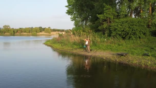 Shooting Drone Top View Two Fishermen Bank Pond Preparing Fishing — Stock Video