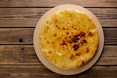 Khachapuri peynirli ve yumurtalı patatesle kapandı.