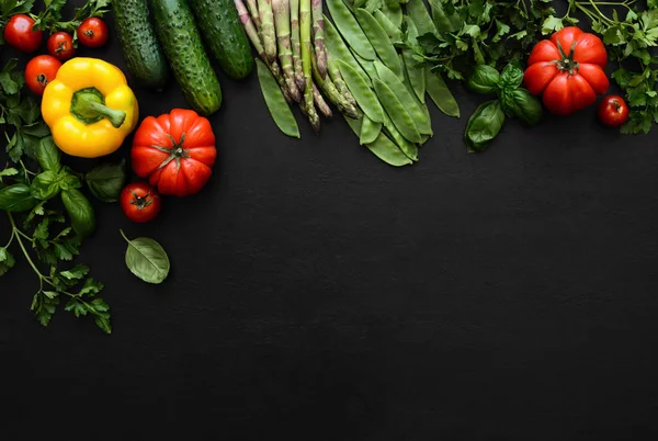 Dark culinary background with fresh produce — Stock Photo, Image