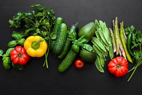 Dark culinary background with fresh produce — Stock Photo, Image