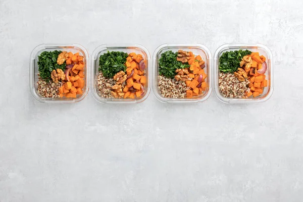 Sauteed kale, quinoa and roasted sweet potato lunch box bowl — Stock Photo, Image