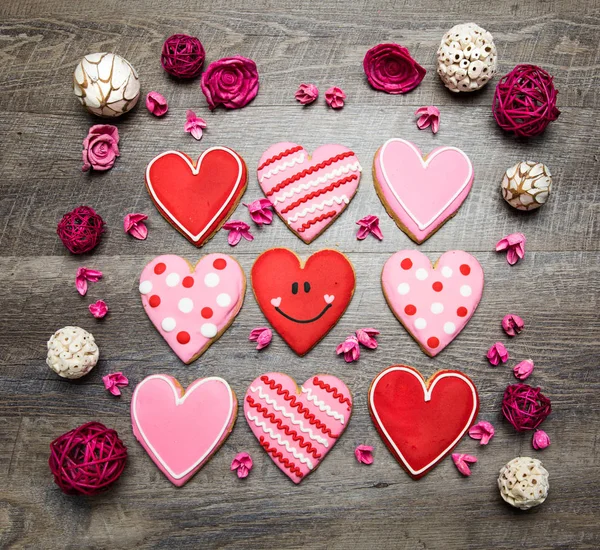 Heart shaped cookies on a rustic wood background for Saint Valentine\'s Day. Valentines Day background