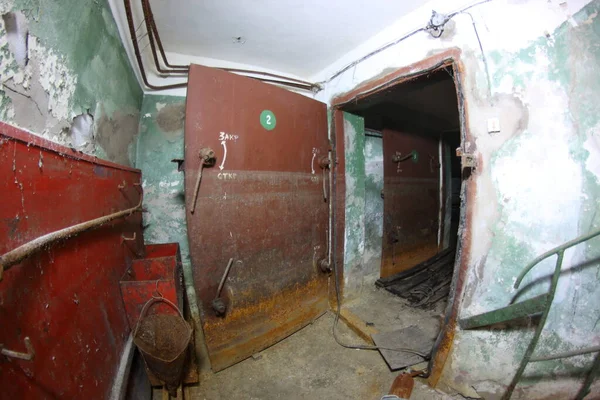 rooms of an abandoned flooded bomb shelter