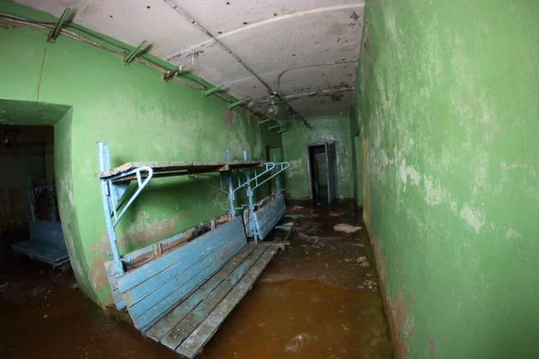 rooms of an abandoned flooded bomb shelter
