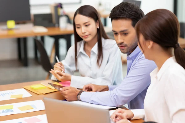 Asian business man and women meeting and talk about job in office.