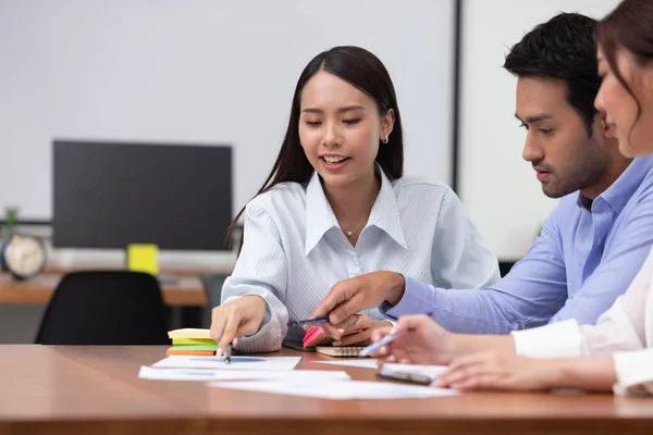 Asian business man and women meeting and talk about job in office.