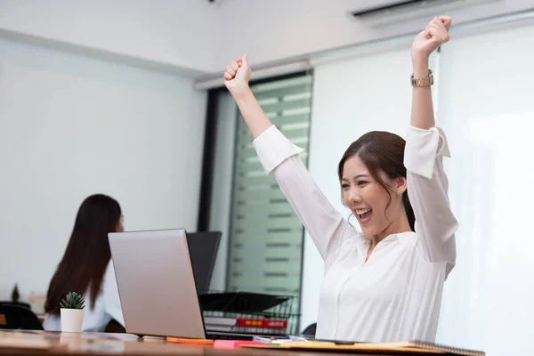 Business asian woman happy working job on laptop in office.