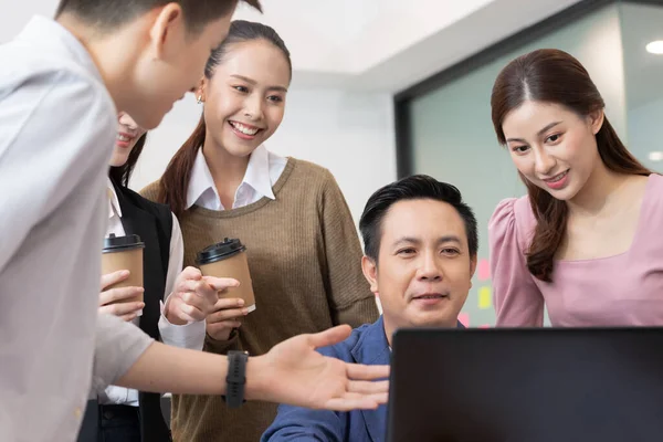 Asian business man and women meeting and talk about job in office.