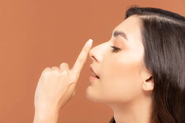 Beauty asian women  touching nose  skin care healthy and skin.