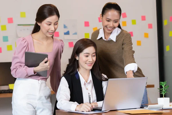 Asian business man and women meeting and talk about job in office.