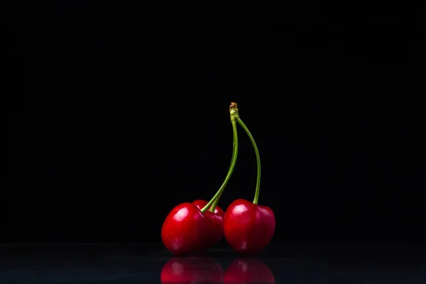 Three Red Cherries Black Background Three Cherries One Stalk Ripe — Stock Photo, Image