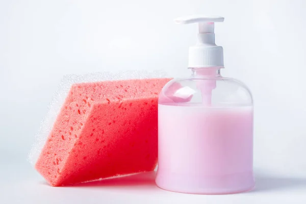 bathing sponge and liquid soap. Means for bathing in the bathroom.