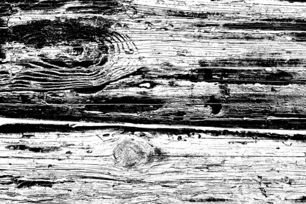 Old plank wooden wall background. The texture of old wood. Weathered piece of wood.