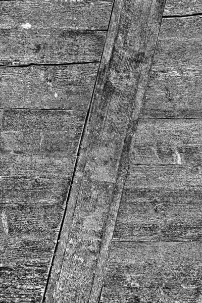 Old plank wooden wall background. The texture of old wood. Weathered piece of wood.