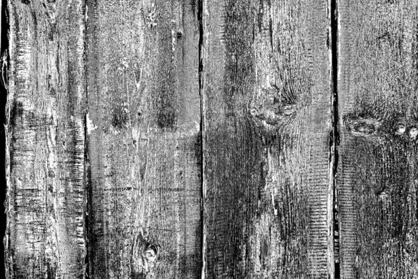 Old plank wooden wall background. The texture of old wood. Weathered piece of wood.