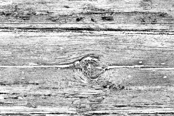 Old plank wooden wall background. The texture of old wood. Weathered piece of wood.