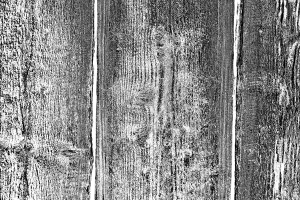 Old plank wooden wall background. The texture of old wood. Weathered piece of wood.