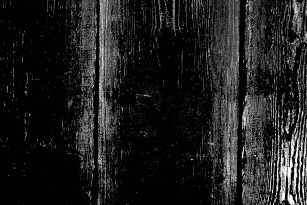 Old plank wooden wall background. The texture of old wood. Weathered piece of wood.