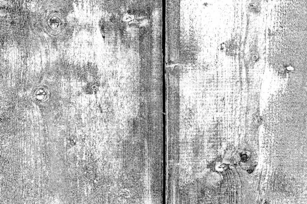 Old plank wooden wall background. The texture of old wood. Weathered piece of wood.