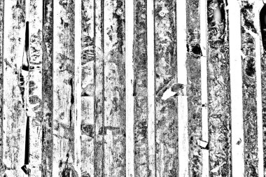 Oluklu metal levha çit görevi görüyor, dikey çizgilere yatay görünüm