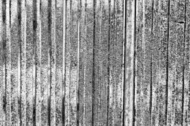 Oluklu metal levha çit görevi görüyor, dikey çizgilere yatay görünüm