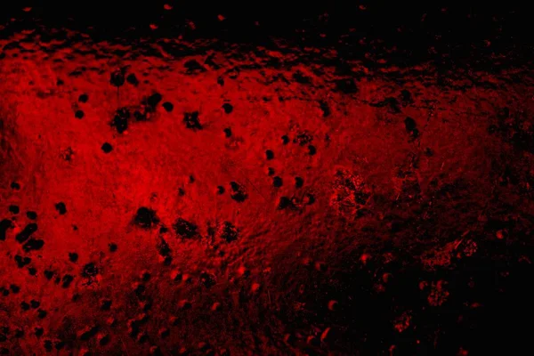 Soyut grunge arkaplanı. Monokrom dokusu. Siyah ve kırmızı desenli arka plan