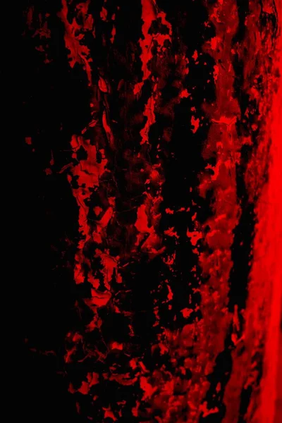 Soyut grunge arkaplanı. Monokrom dokusu. Siyah ve kırmızı desenli arka plan