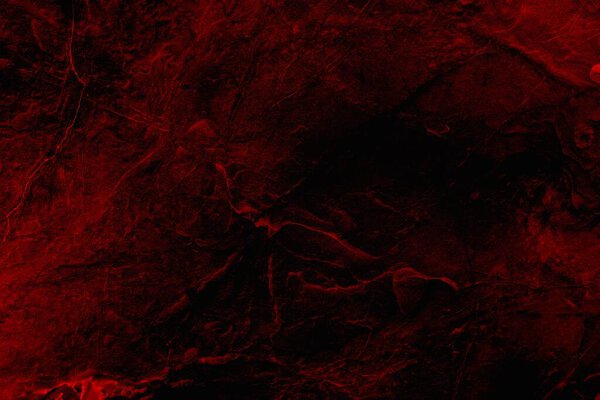 Abstract grunge background. Monochrome texture. Black and red textured background