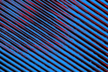 Kırmızı ve mavi renkli grungy duvar, desenli arka plan