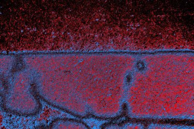 Kırmızı ve mavi renkli grungy duvar, desenli arka plan