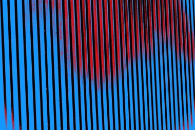 Kırmızı ve mavi renkli grungy duvar, desenli arka plan