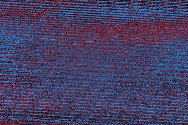 Kırmızı ve mavi renkli grungy duvar, desenli arka plan