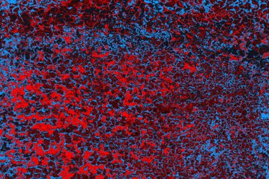 Kırmızı ve mavi renkli grungy duvar, desenli arka plan