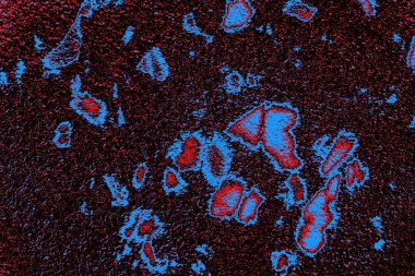 Kırmızı ve mavi renkli grungy duvar, desenli arka plan