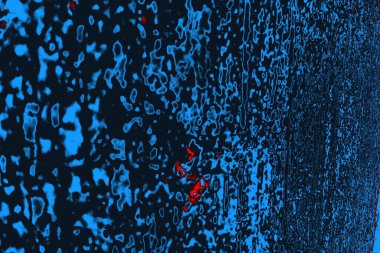 Kırmızı ve mavi renkli grungy duvar, desenli arka plan