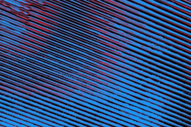 Kırmızı ve mavi renkli grungy duvar, desenli arka plan