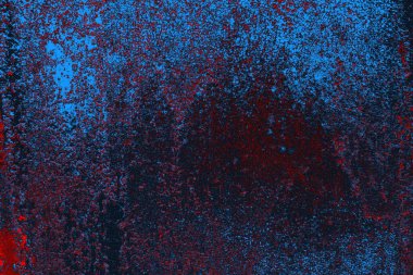 Kırmızı ve mavi renkli grungy duvar, desenli arka plan