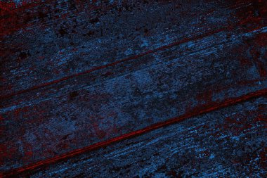 Koyu renkli ses, arka planda çatlaklar olan grunge duvar dokusu