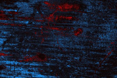 Koyu renkli ses, arka planda çatlaklar olan grunge duvar dokusu