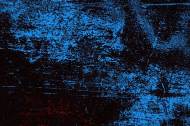 Koyu renkli ses, arka planda çatlaklar olan grunge duvar dokusu