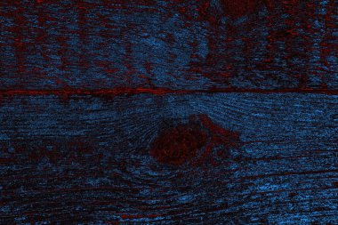 Kırık tarih arkaplanı olan kırmızı, mavi ve siyah grunge duvar