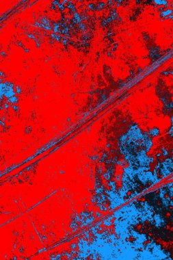 Neon kırmızı ve mavi renkli grunge duvar dokusu arkaplanı