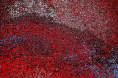 Kırık tarih arkaplanı olan kırmızı, mavi ve siyah grunge duvar