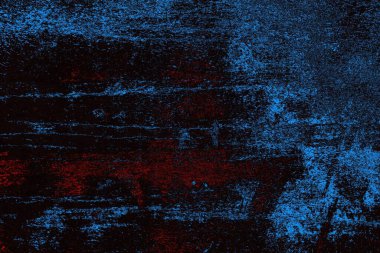 Koyu renkli ses, arka planda çatlaklar olan grunge duvar dokusu