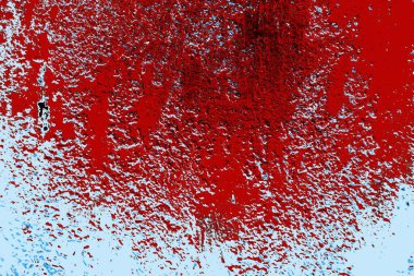 kırmızı mavi ve siyah duvar dokusu ve soyulmuş eski boya. 