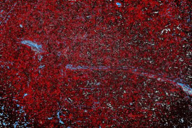 Kırık tarih arkaplanı olan kırmızı, mavi ve siyah grunge duvar