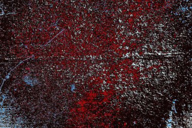 Kırık tarih arkaplanı olan kırmızı, mavi ve siyah grunge duvar