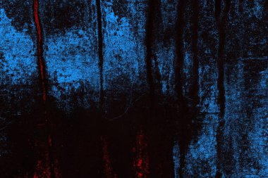 Koyu renkli ses, arka planda çatlaklar olan grunge duvar dokusu